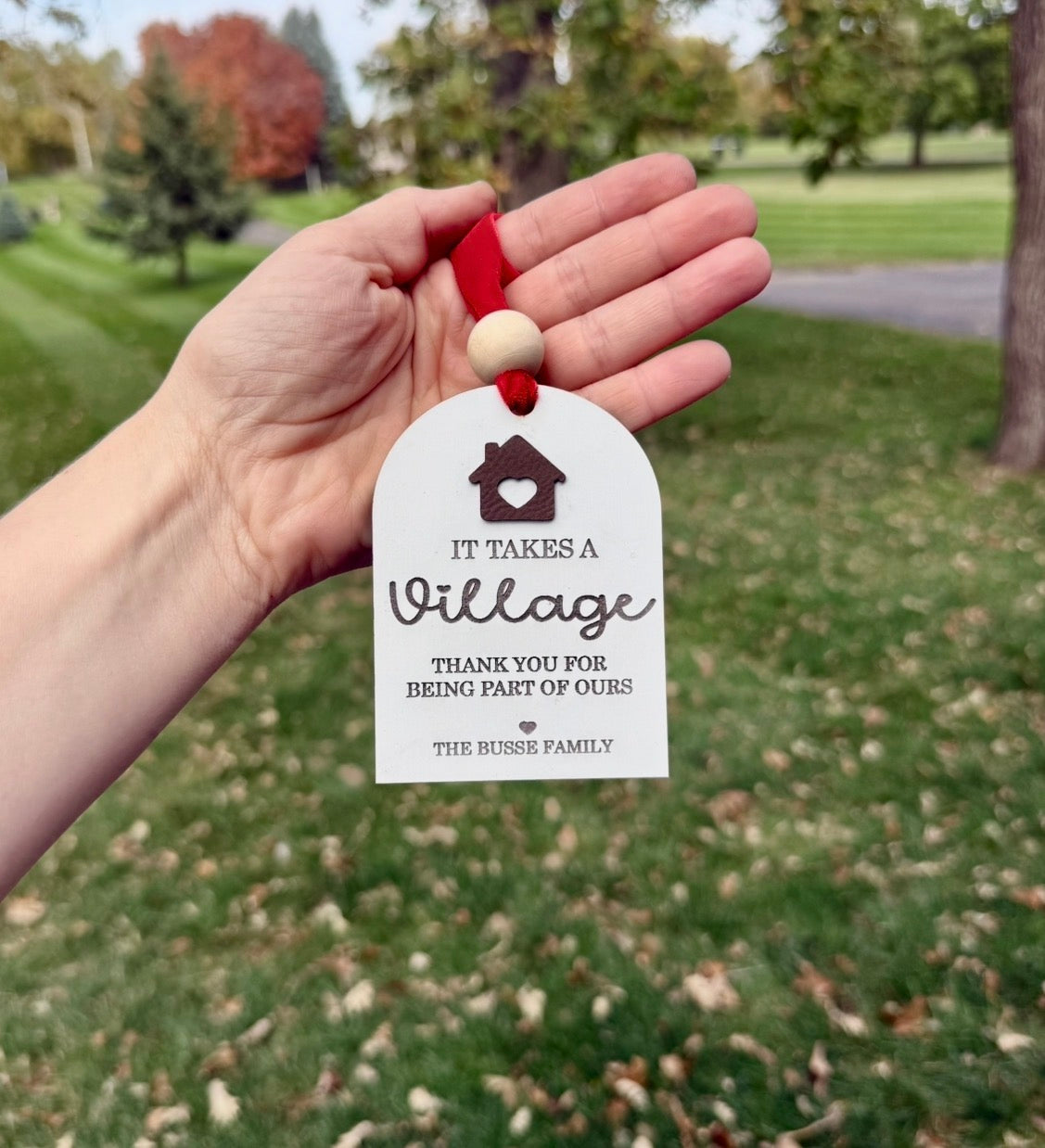 It takes a village ornament