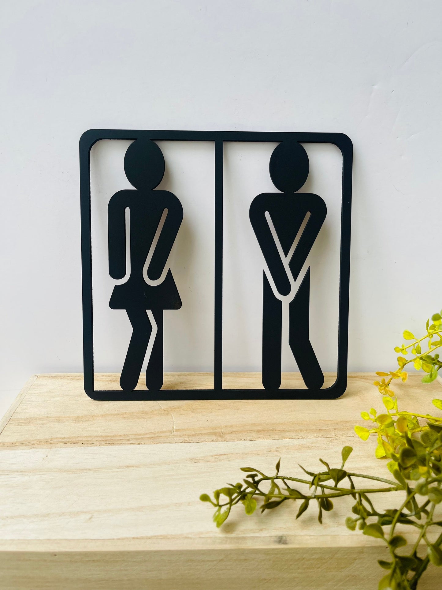 Funny figure bathroom sign, cutout figures sign