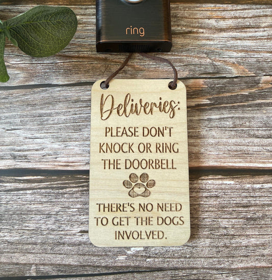 Deliveries please don’t knock or ring the doorbell, there’s no need to get the DOGS involved sign, front door sign